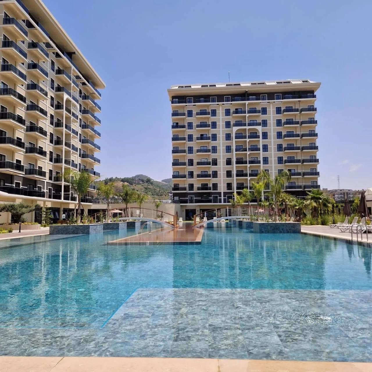 Квартира 1+1 в ЖК Exodus Riverside, Демирташ