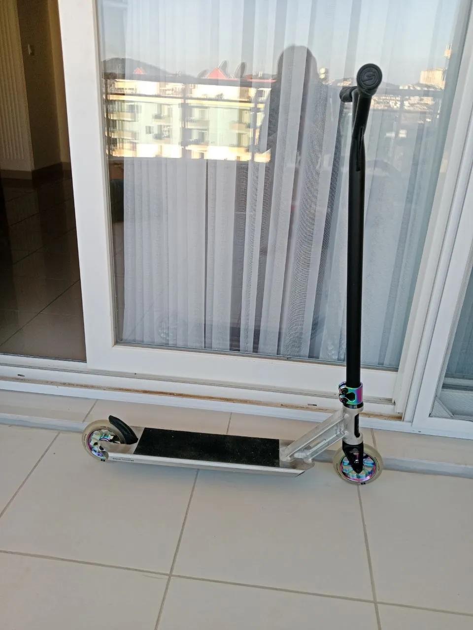 Трюковой самокат Oxelo