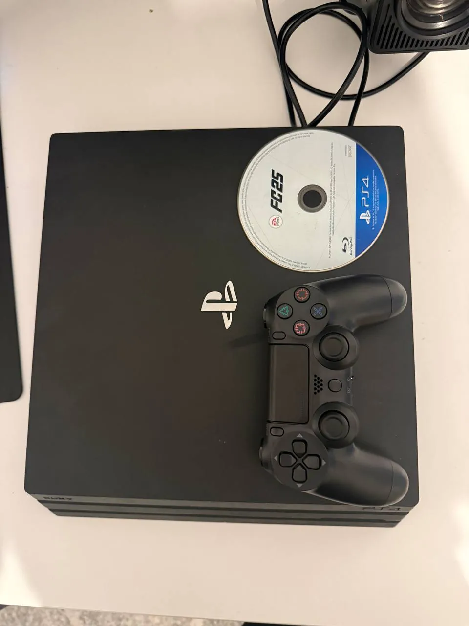 PlayStation 4 Pro 500 ГБ с игрой FIFA 25 1