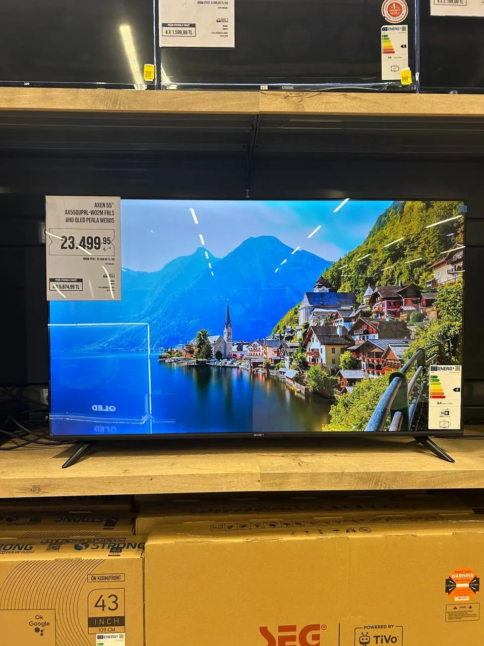 Новый телевизор AXEN55 UHD QLED 1