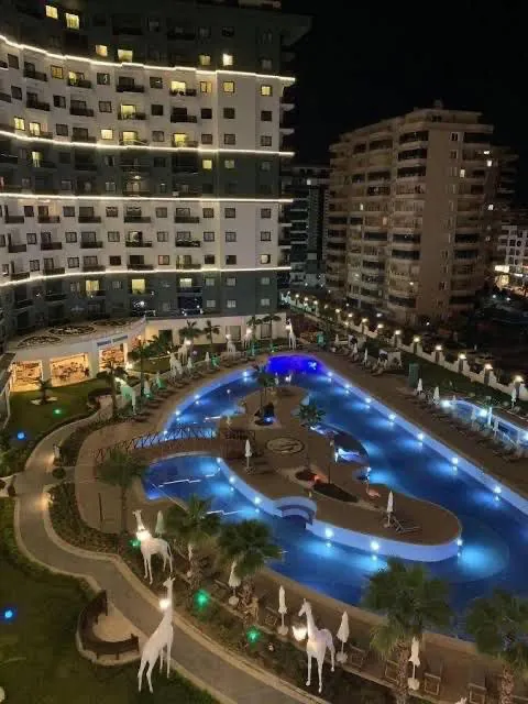 Квартира 1+1 с бассейном в Махмутларе 1